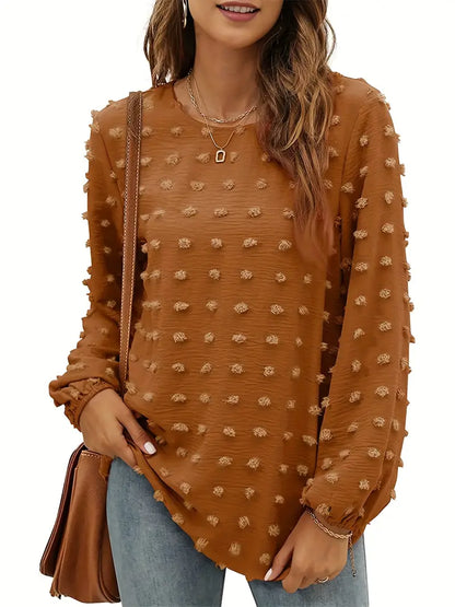 Blouse texturée unie à pois suisses